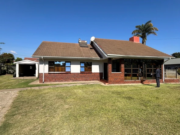 Charming 3-Bedroom Home with Spacious Yard, Staff Quarters & Office Space